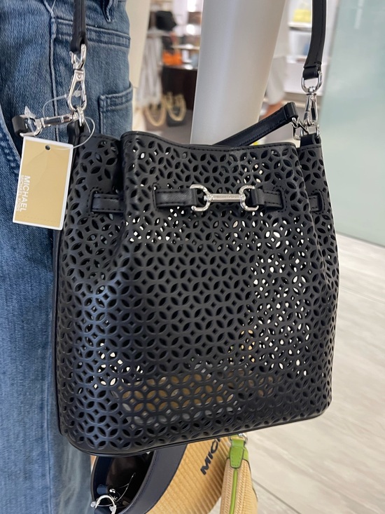 Michael Kors Handbags - NWT MICHAEL KORS Carson Small Floral Laser-Cut Bucket Bag in Black